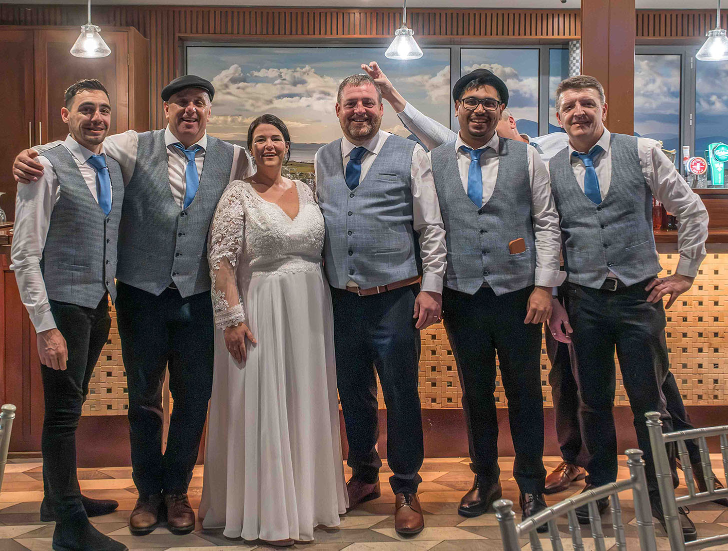 Group photo with happy couple